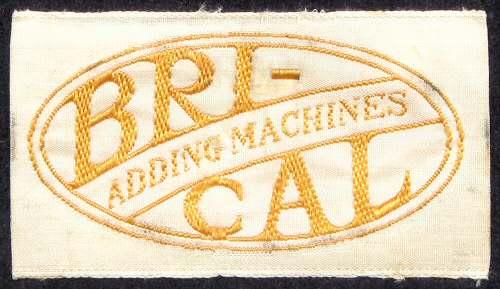 British Calculators Brical Embroidered Oval Logo From Case Lining Source: John Wolff